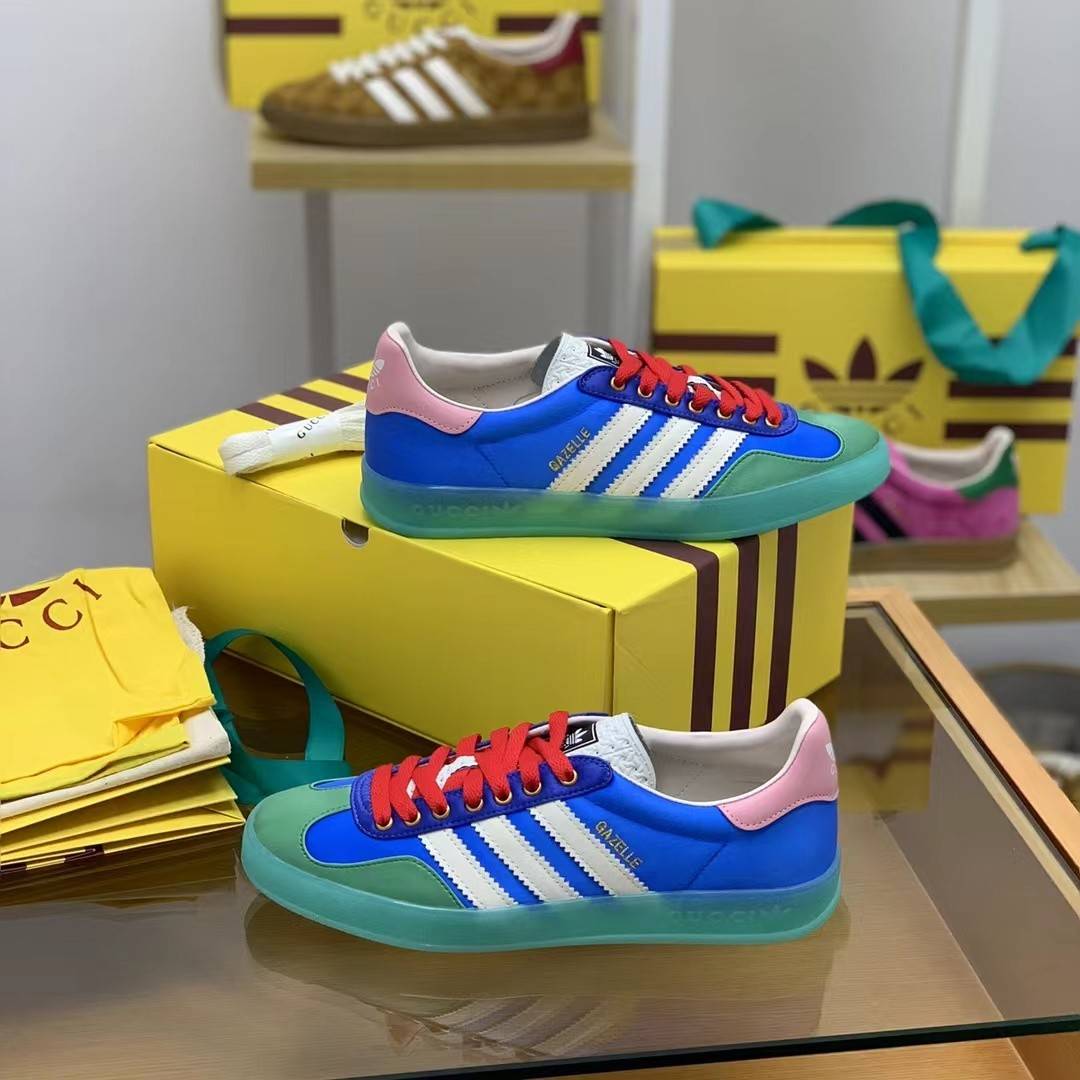 GU*I× Adidas sneakers