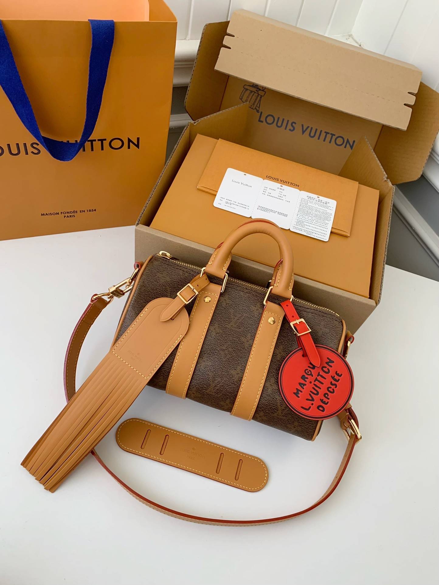 L*V The New Keepall Bandouli ère 25 handbag M11542 Size:25*15*11cm