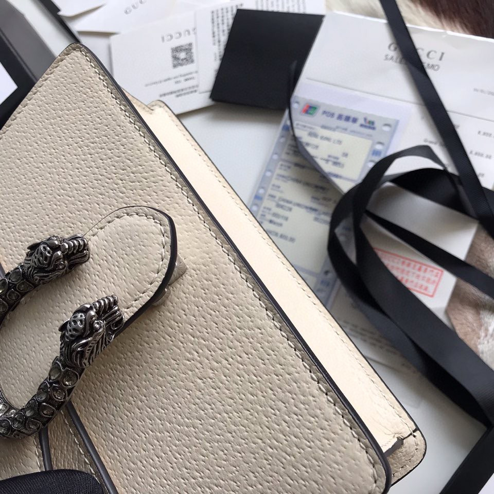G*u*i dionysus bag